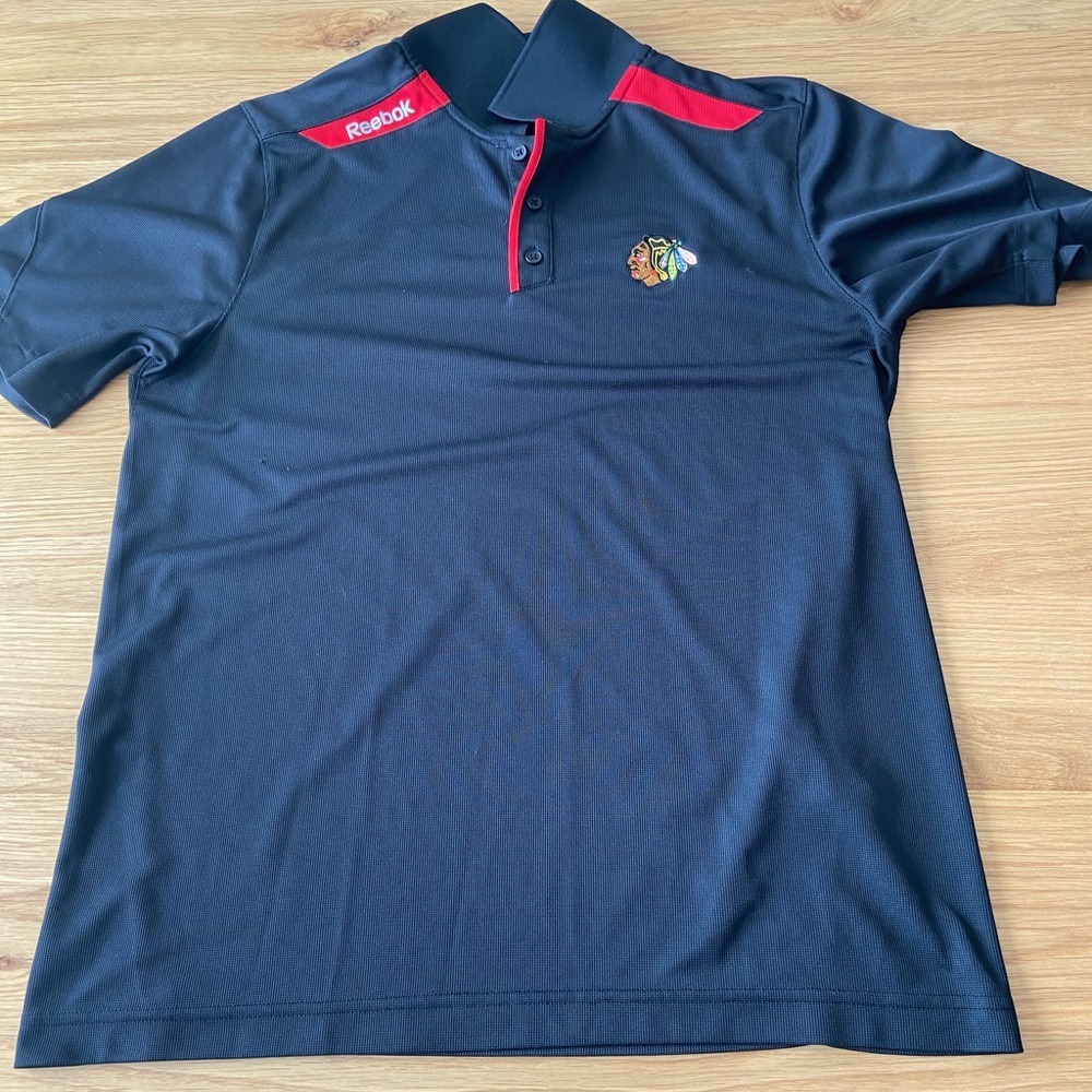 EUC Men’s Reebok Blackhawks Hockey Performance Polo
